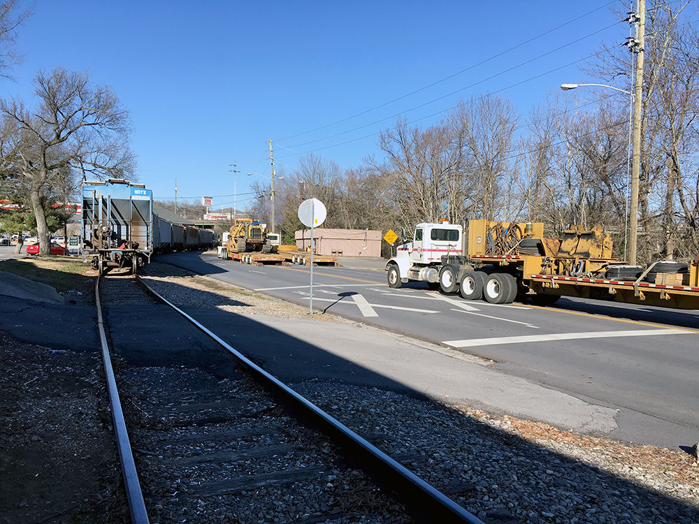 Part of train derails near Glenn Milner, blocks road for hours